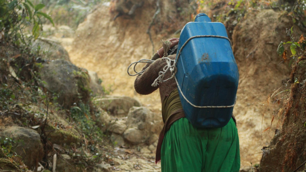 Someone carrying water in Nepal