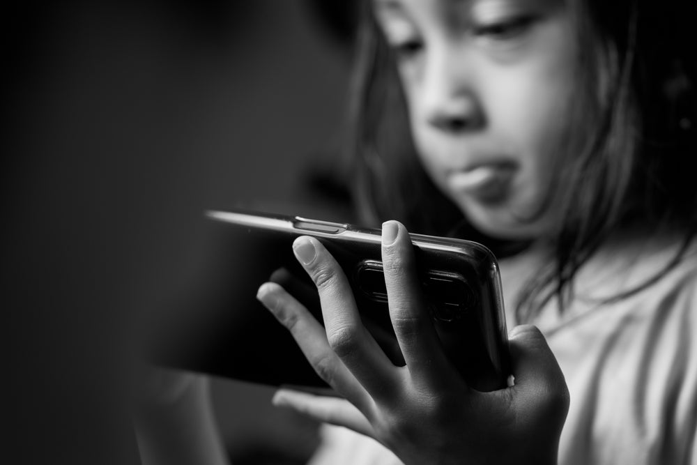 Young girl using a smartphone