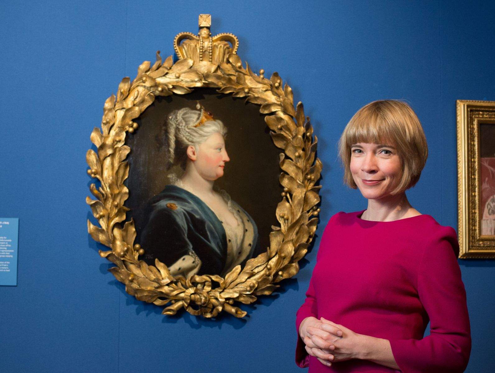 Lucy Worsley with a portrait of Queen Caroline  by Joseph Highmore. Photo: BBC/Royal Collection Trust/Jack Barnes